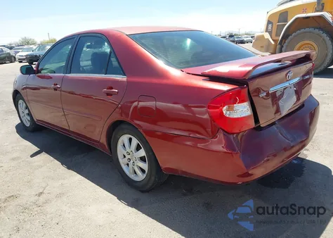 2002 Toyota Camry Le z USA, uszkodzony, nr VIN 4T1BE32K52U082454